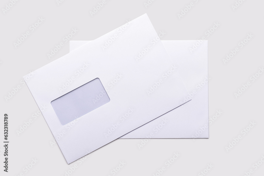 Paper envelopes on light background