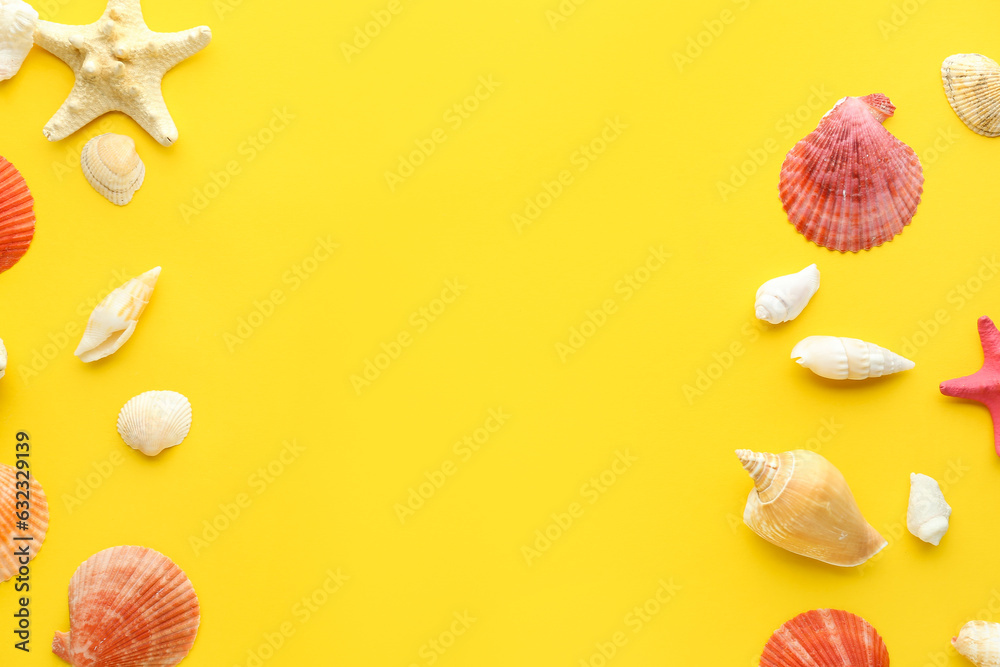 Frame made of different seashells and starfish on yellow background