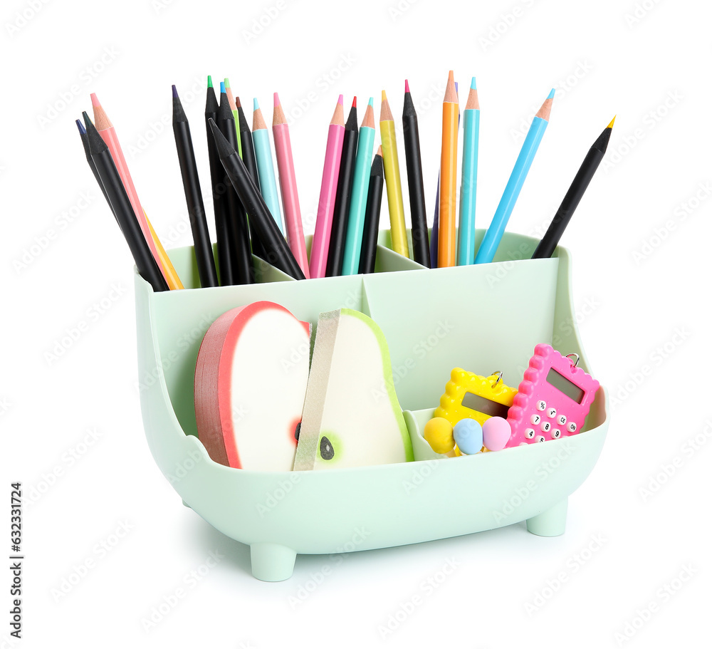 Holder with color pencils and different stationery on white background