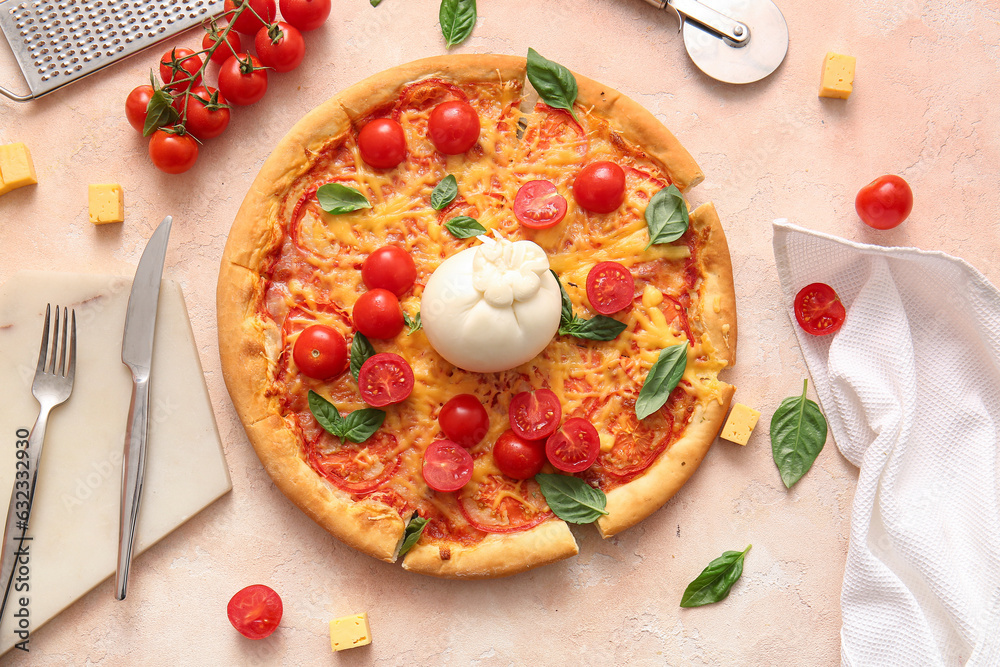 Tasty pizza with Burrata cheese on beige background