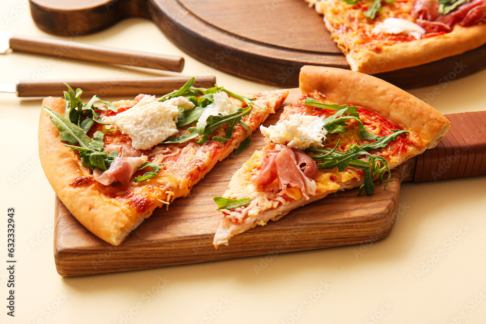 Slices of tasty pizza with Burrata cheese on yellow background