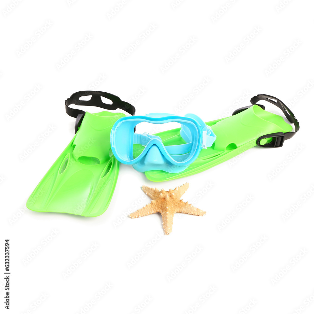 New swimming mask, starfish and flippers on white background