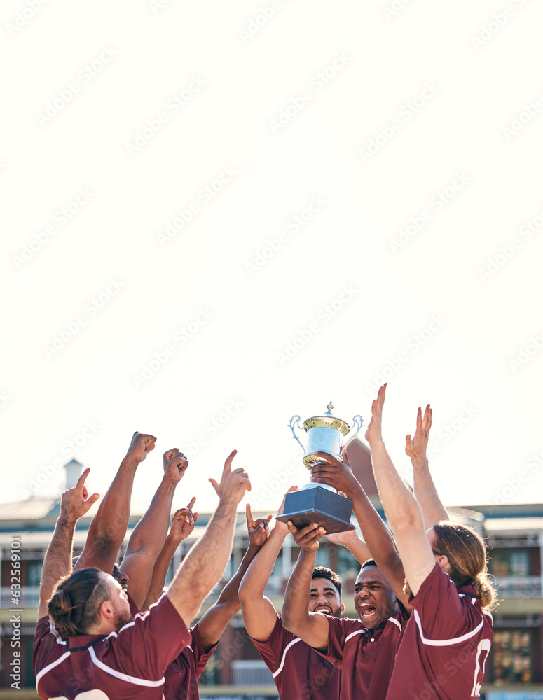 Rugby, team and winning with trophy, champion and men at stadium with success, celebration and achie