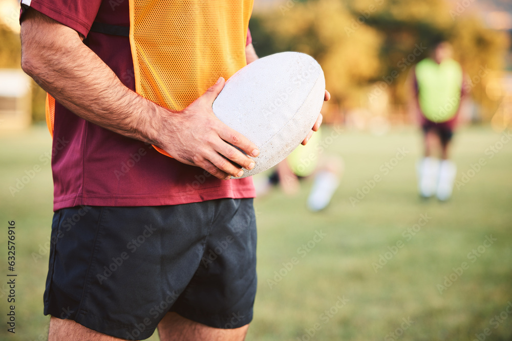 Rugby, man and hands with ball for sports games, competition and contest on field. Closeup of athlet