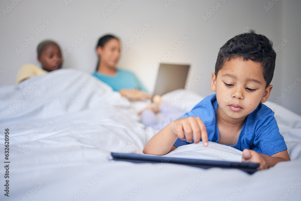 Children, tablet and education with a family in bed in the morning to relax together at home. Kids, 