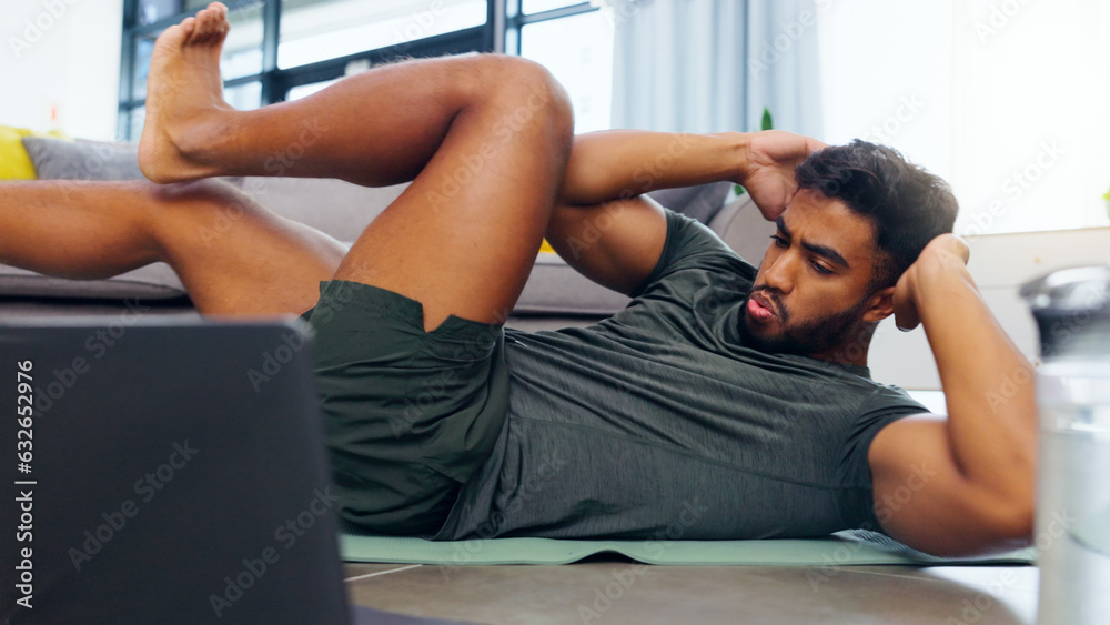 Fitness man, home workout and laptop while watching online exercise tutorial in the living room at h