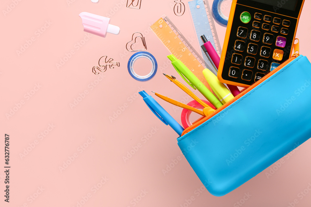 Bright pencil case with different stationery flying on pink background