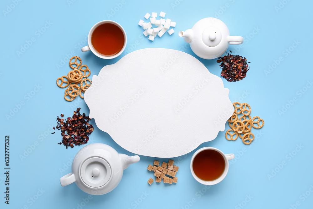 Composition with blank board, cups of tea, sugar and pretzels on color background