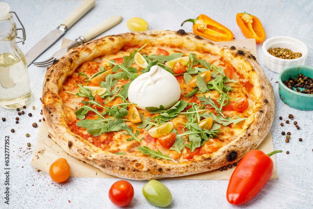 Tasty pizza with Burrata cheese on white background