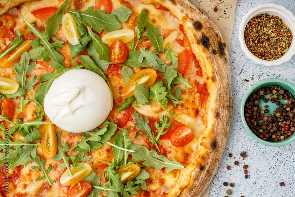 Tasty pizza with Burrata cheese on grey background