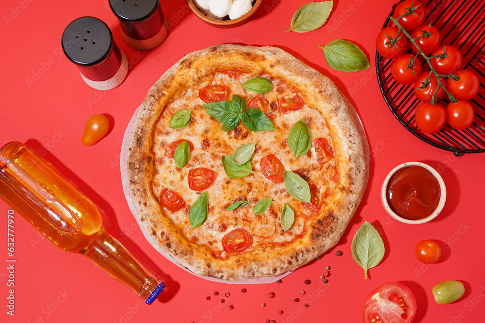 Tasty pizza Margarita with tomatoes and basil on red table