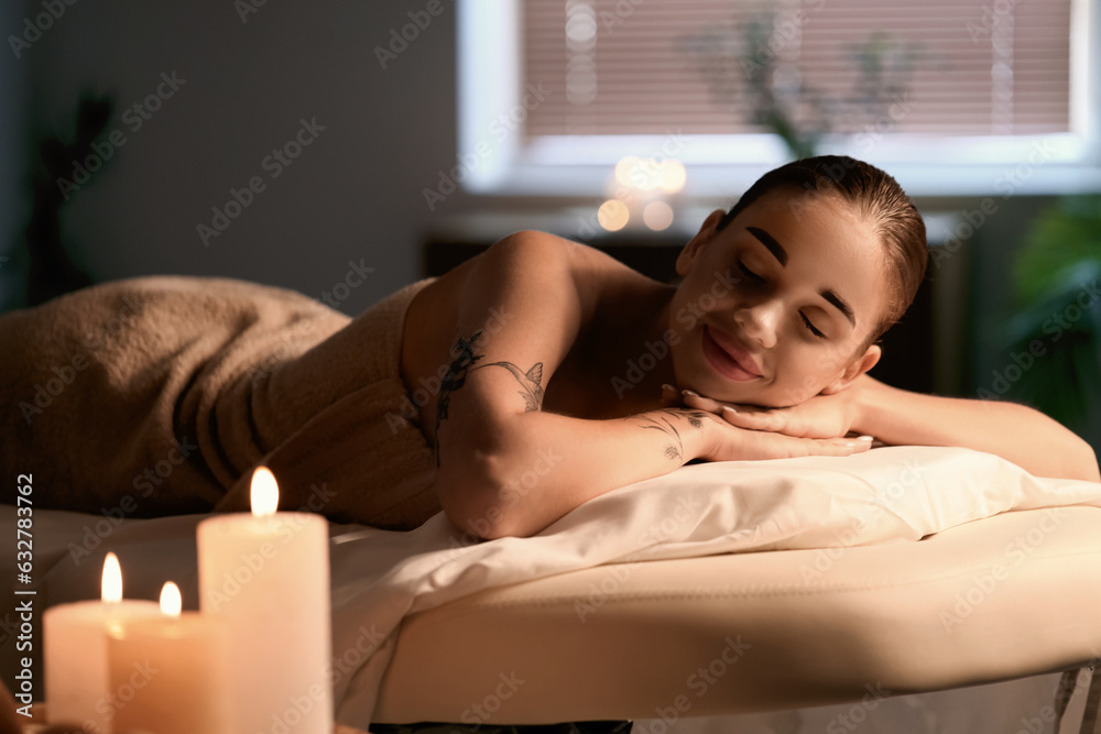 Pretty young woman in spa salon