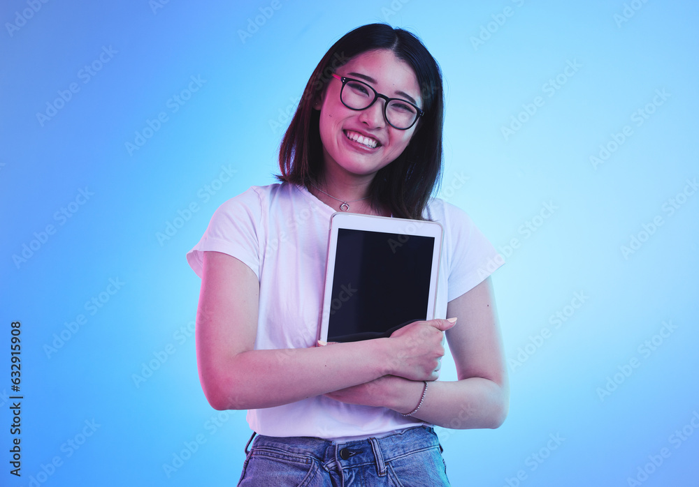 Young woman, student and tablet mockup for online education, e learning or study on blue, studio bac