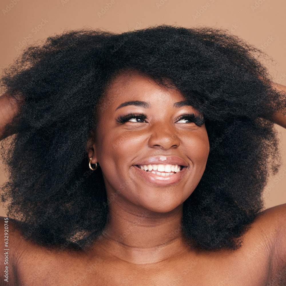 Thinking, black woman and hair care for afro, smile and natural beauty on a brown studio background.