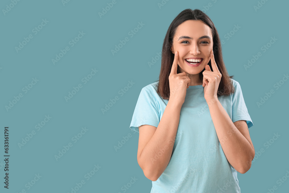 Thinking young woman on blue background