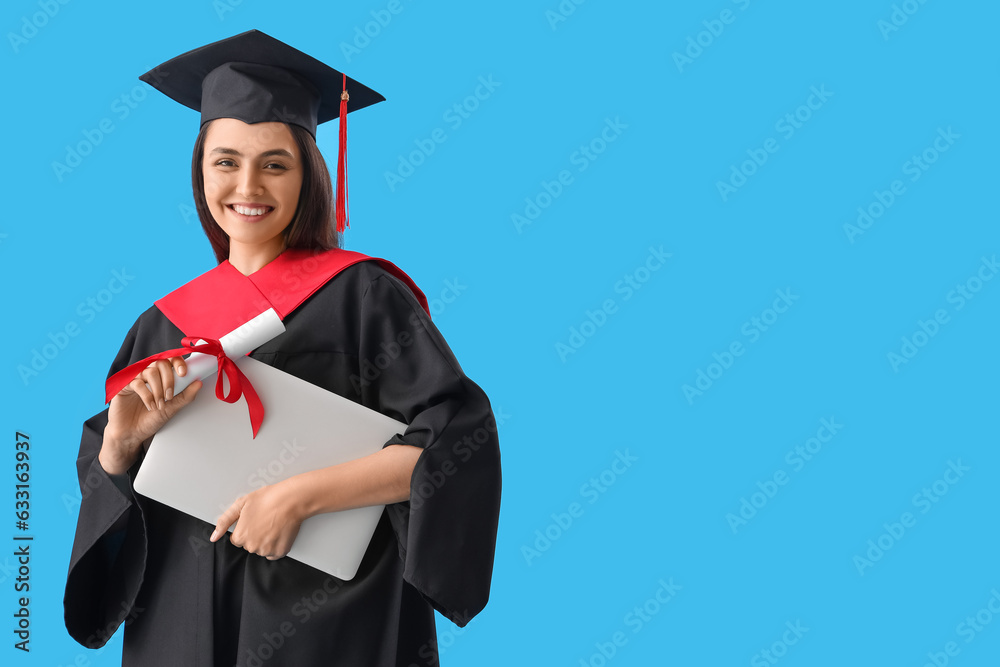 Female graduate student with diploma and laptop on blue background