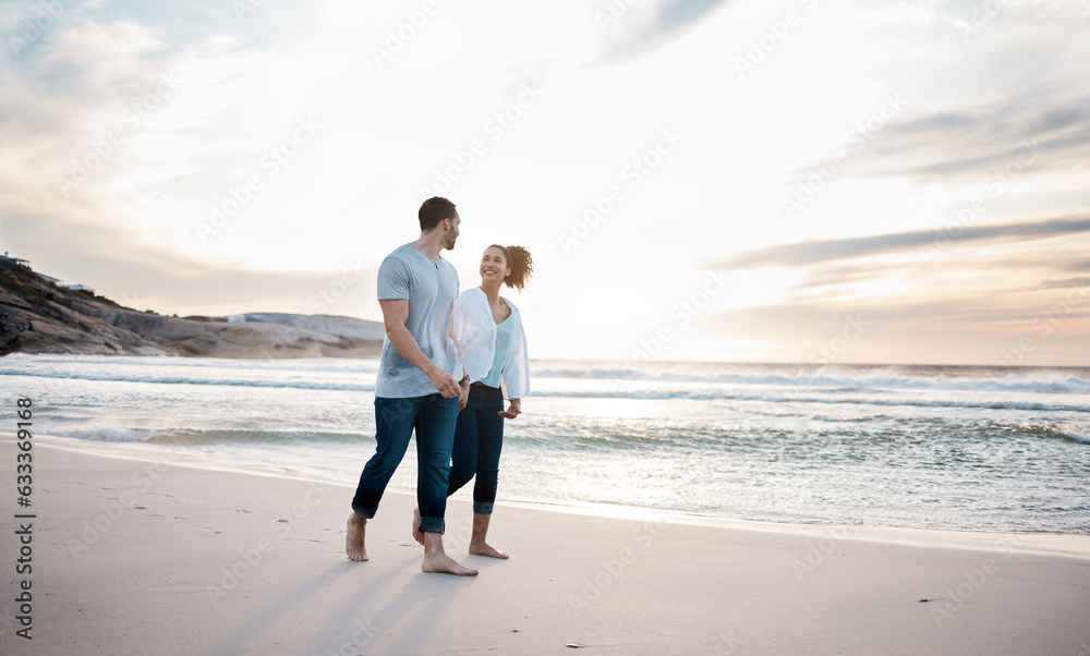 Couple, holding hands and walking on beach at sunset for Portugal holiday, vacation and travel break