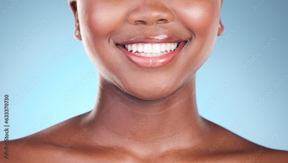 Woman, teeth and smile in dental care, hygiene or treatment against a blue studio background. Closeu