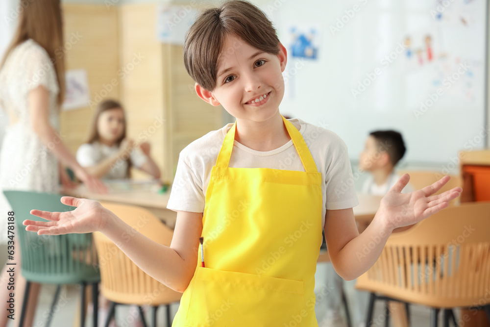 Little boy in art class