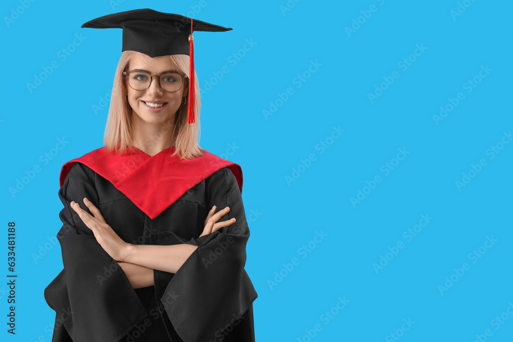 Female graduate student on blue background