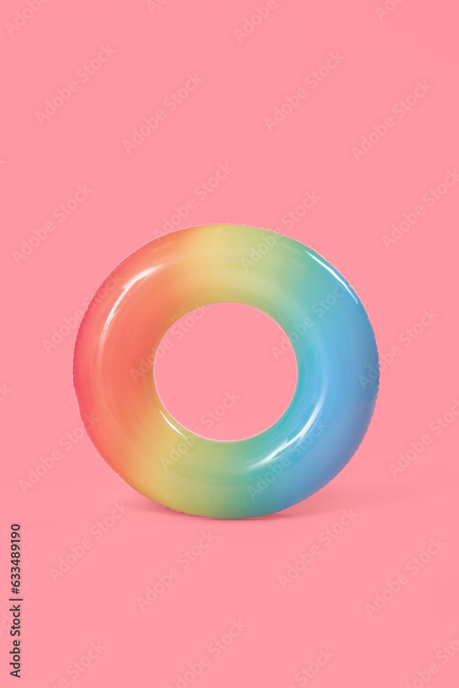 Inflatable ring on pink background