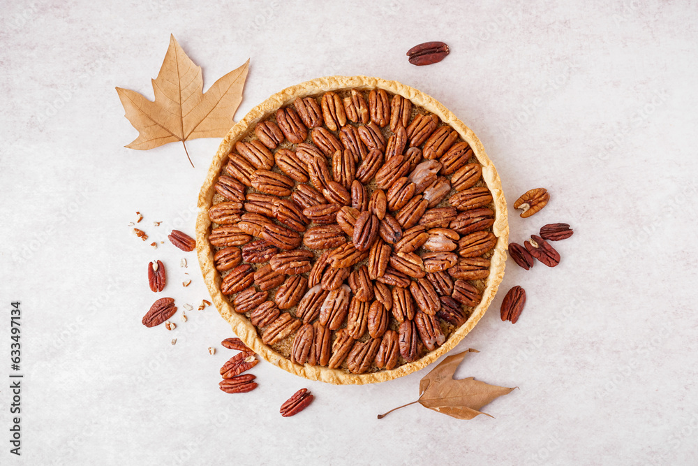 Tasty pecan pie on light background