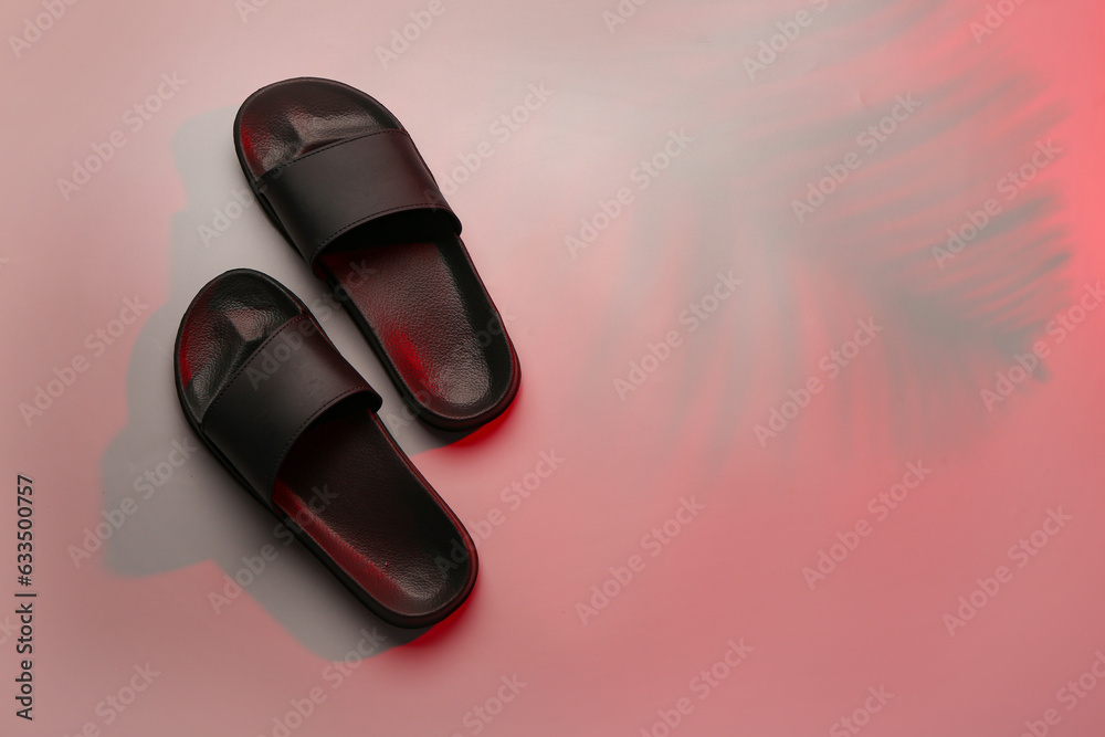 Female stylish flip flops on grey background