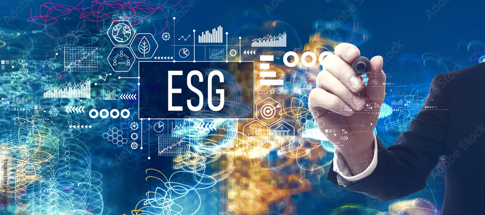 ESG - Environmental, Social and Governance concept with businessman in a bokeh neon light trails cit