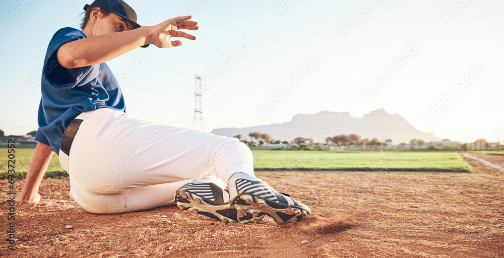 Slide, baseball action and player in dirt for game or sports competition on a pitch in a stadium. Ma