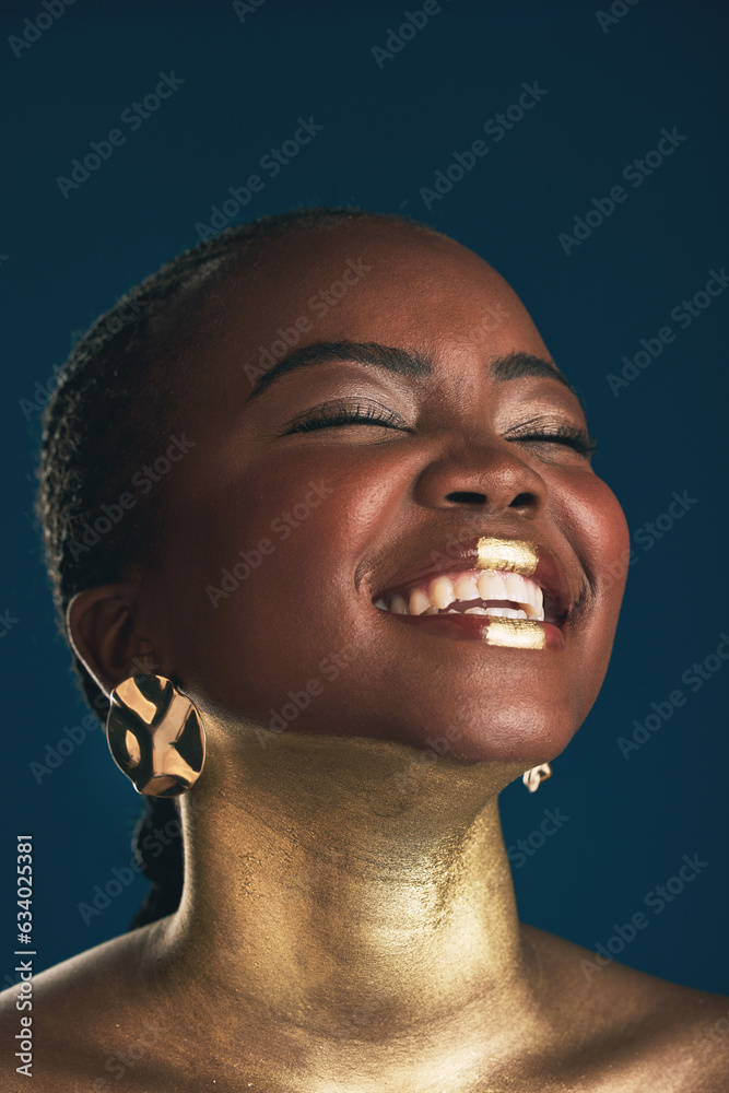 Gold makeup, face and black woman laughing at funny creativity, facial cosmetics paint and beauty ar