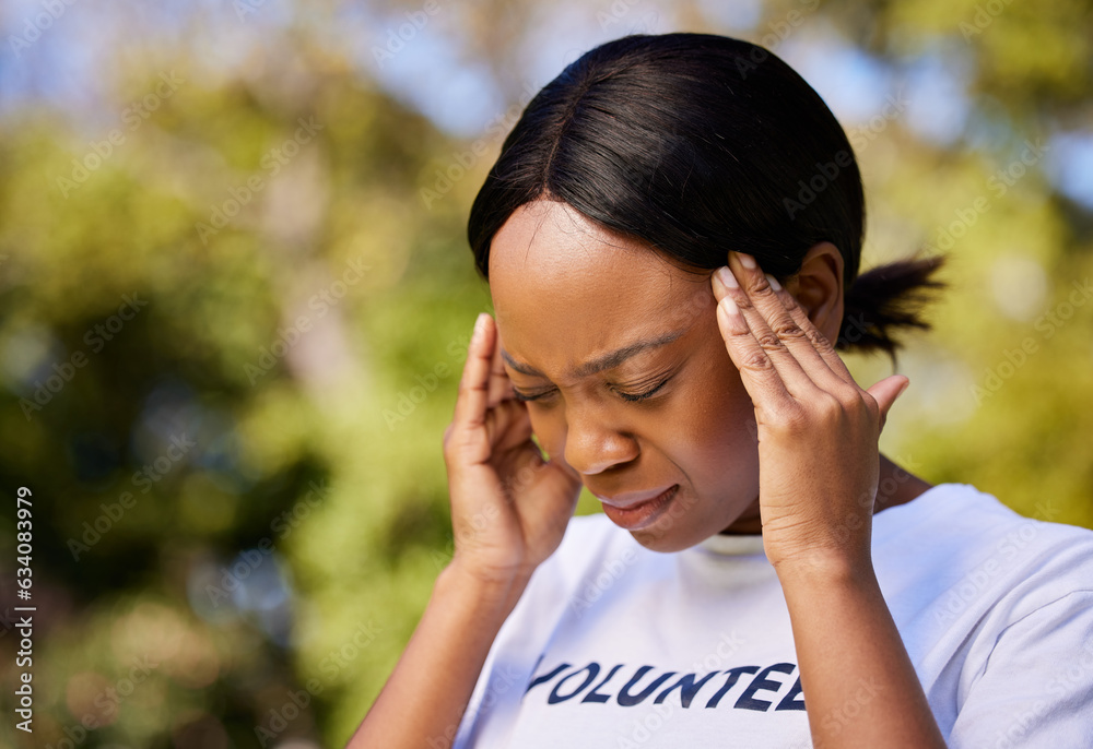 Black woman, headache and stress in mistake, debt or burnout from volunteer work in outdoor nature. 