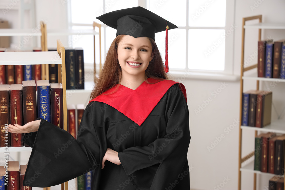 Female graduate student in library