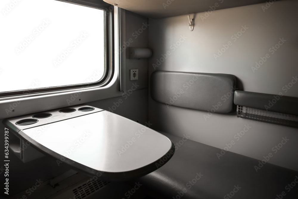 Interior of train compartment with table