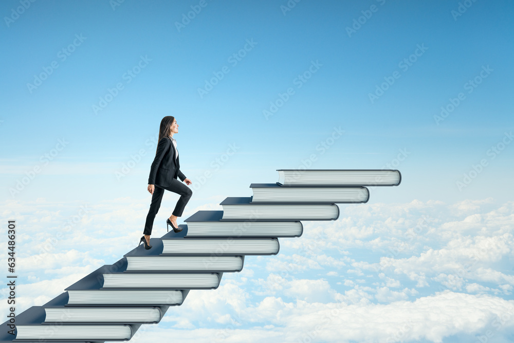 Side view of young businesswoman climbing book steps on bright blue sky with clouds background. Mock