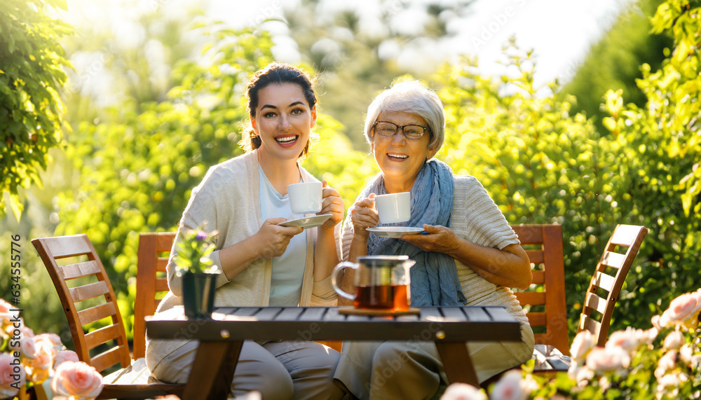 women drinking tea in the garden