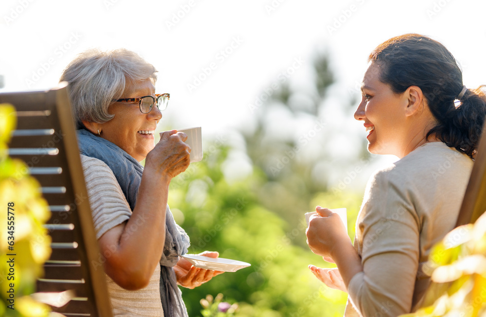 women drinking tea in the garden