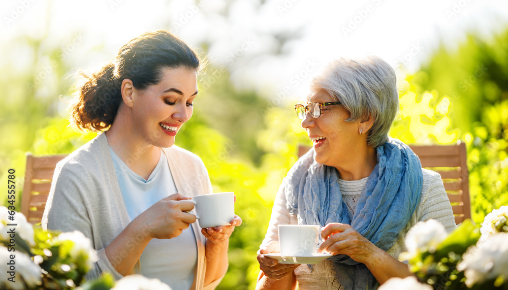 women drinking tea in the garden