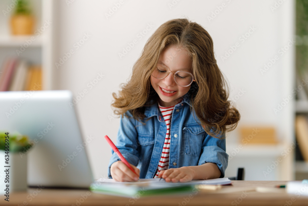 Girl doing homework or online education.