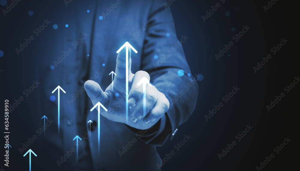 Close up of businessman touching digital arrow on virtual screen. Success concept