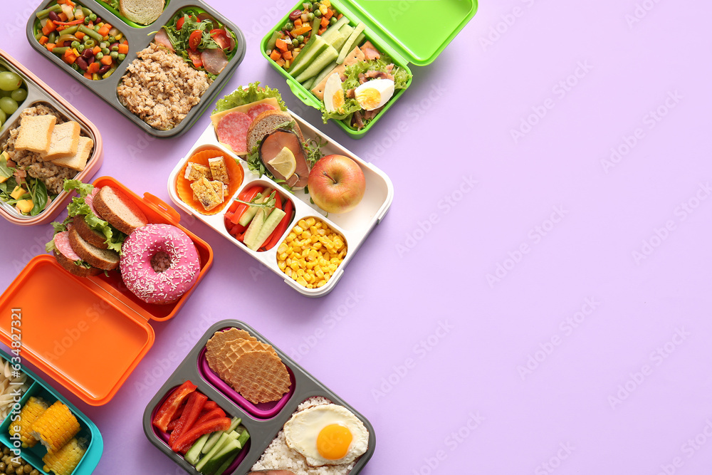 Many lunchboxes with different delicious food on lilac background