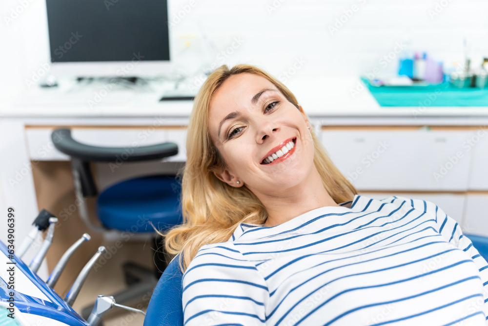 Portrait of Caucasian woman patient and dentist at health care clinic. 