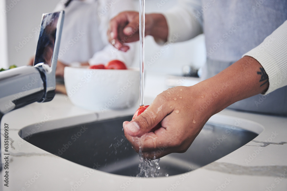 Water, tomato and person hands cleaning vegetable for cooking in a kitchen basin or sink in a home f