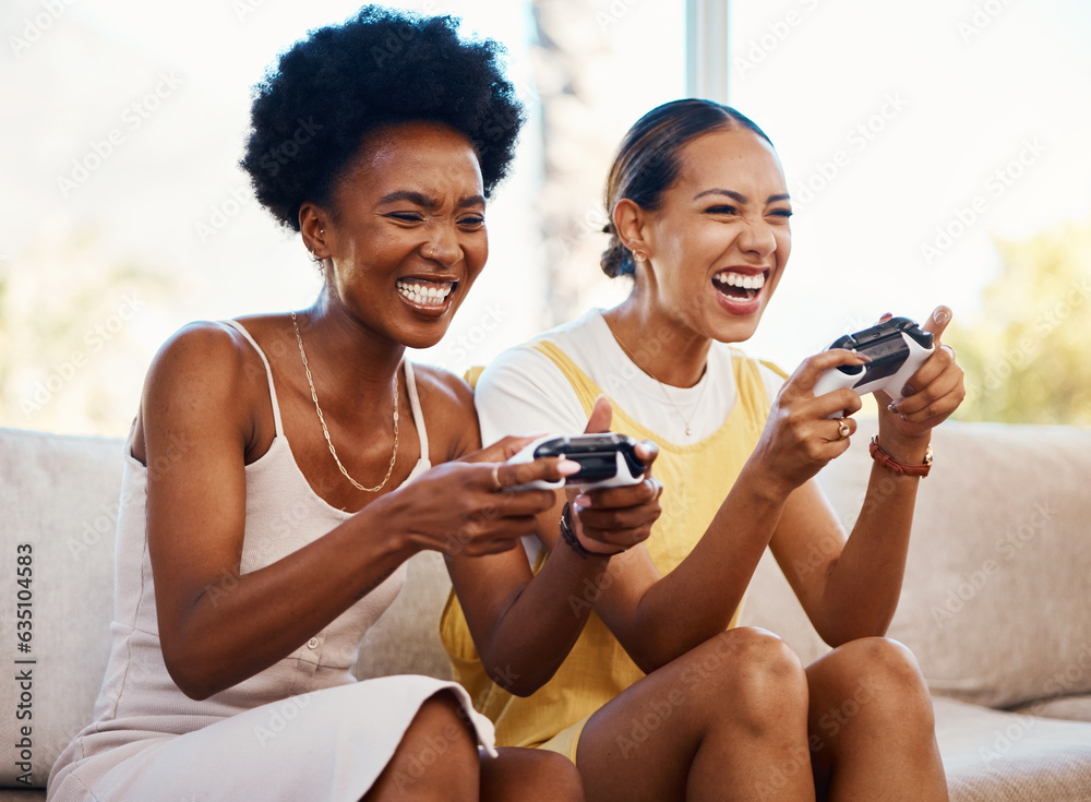 Women on couch playing video games, excited fun and relax in home living room together with internet