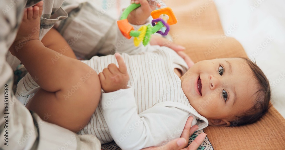 Baby child, rattle toys and bed with mother, playing or care in family home for learning with childh