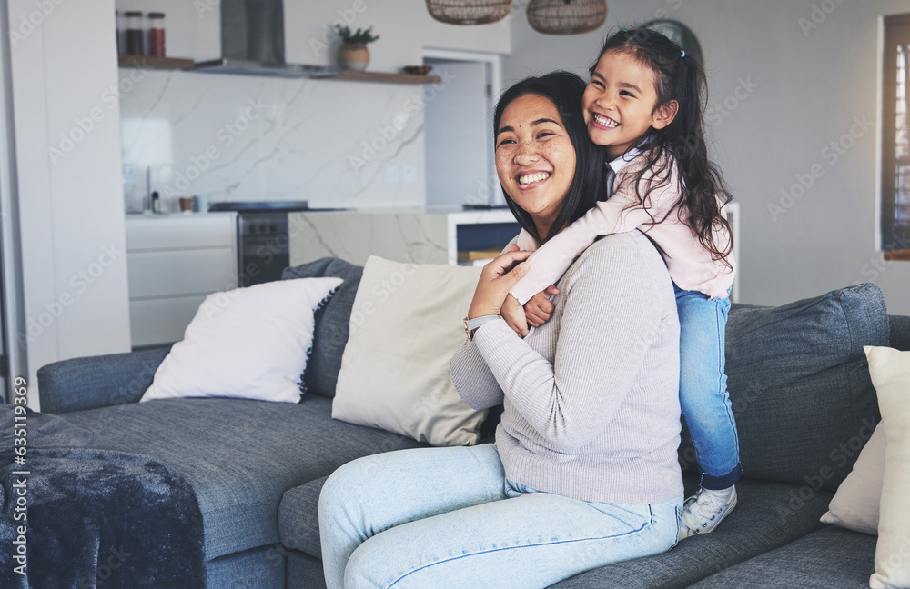 Hug, happy and love with mother and daughter on sofa for playful, care and support. Smile, calm and 