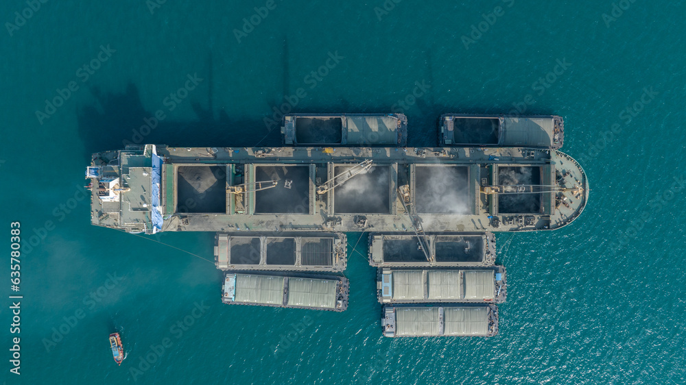 Powder Barge Ship load cement powder to large cargo ship in the Ocean export concept. powder materia