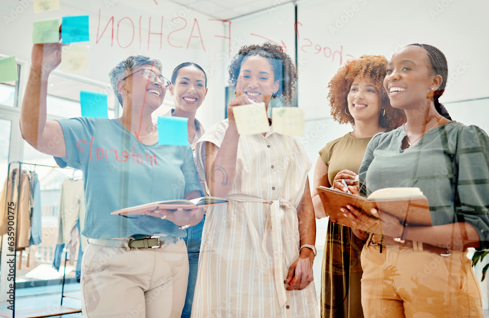 Happy creative women, writing and meeting in planning, brainstorming or team strategy on glass board