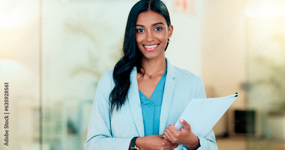 Happy, confident and successful businesswoman holding files while doing admin in an office. Female e