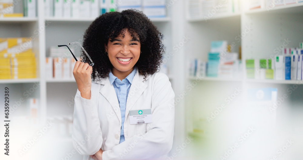 A friendly female pharmacist with a bright smile is about to help patients at the dispensary. Portra