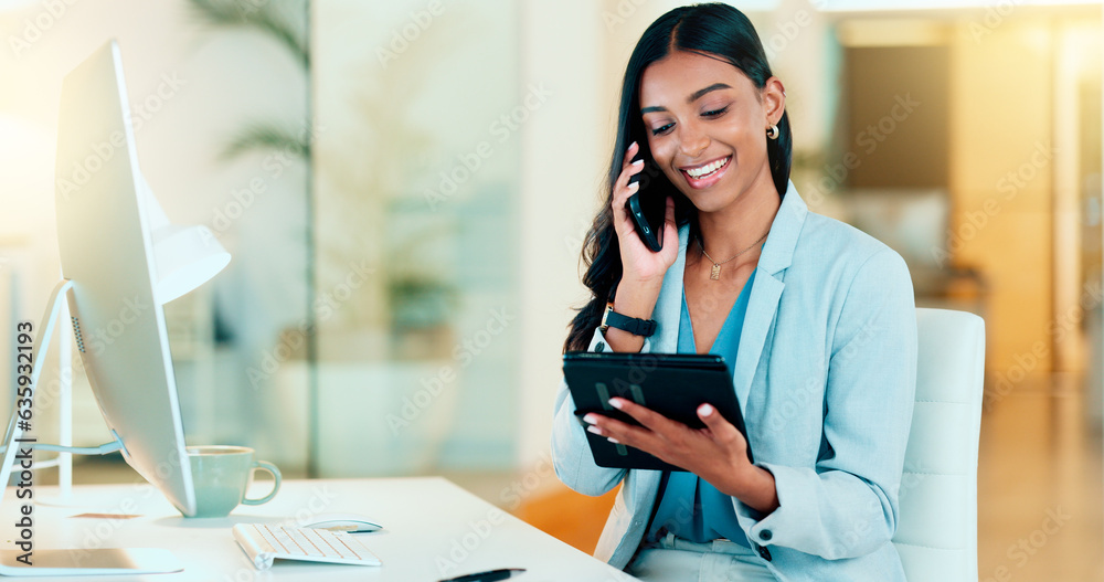 Happy manager talking on a phone in modern office, booking appointment or arranging a meeting on tab